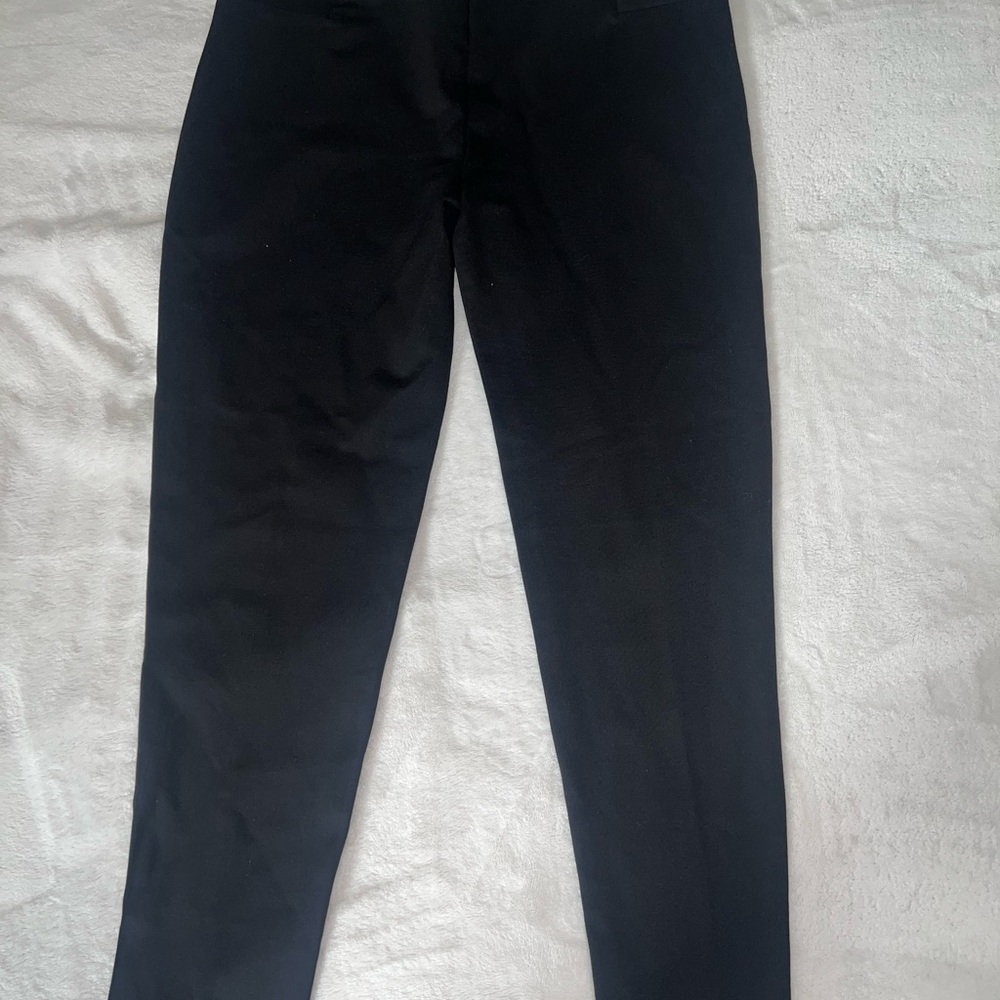 Black strategy leggings in a size L. Brand new